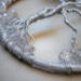 side view illustrates details of glass beaded roots and twisted tree trunk